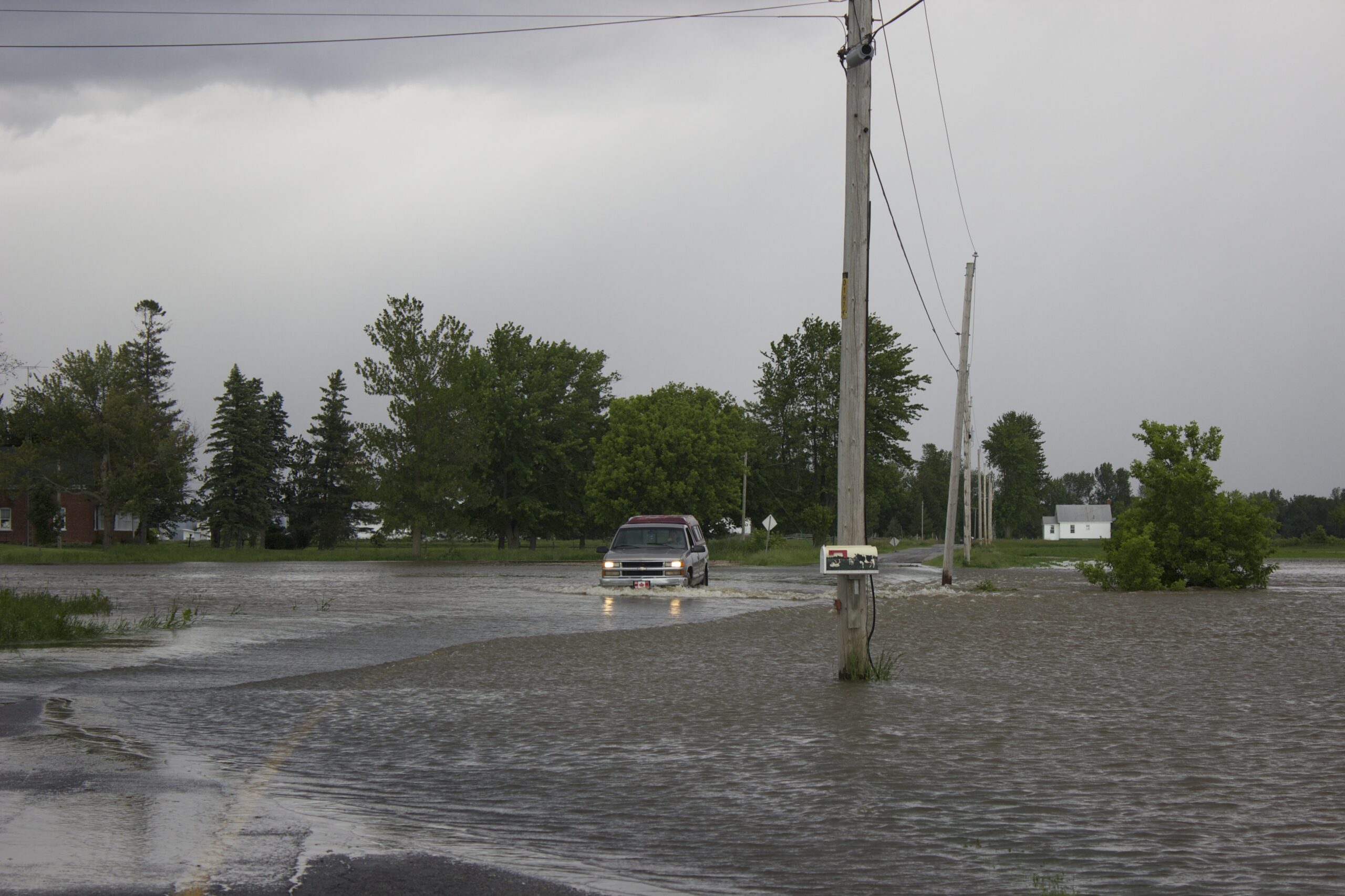 Floodwater covering a residential road